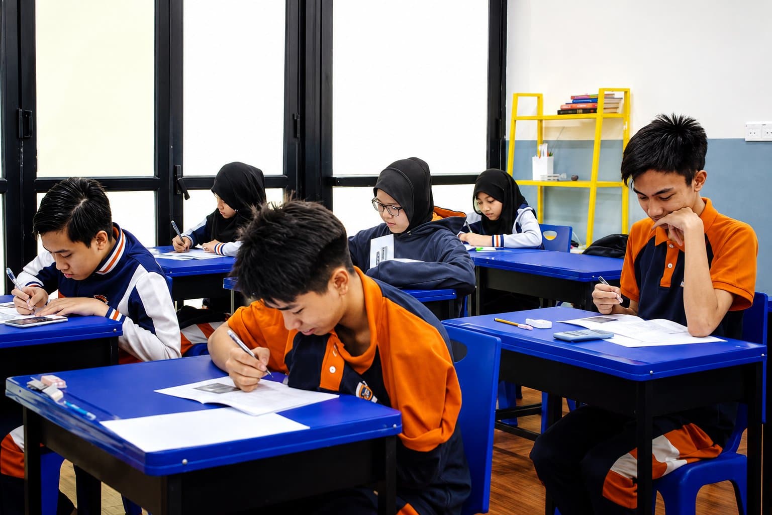 Falih Junior Secondary student studying in class